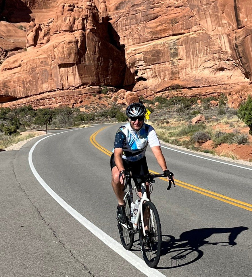 Matt cycling a canyon road